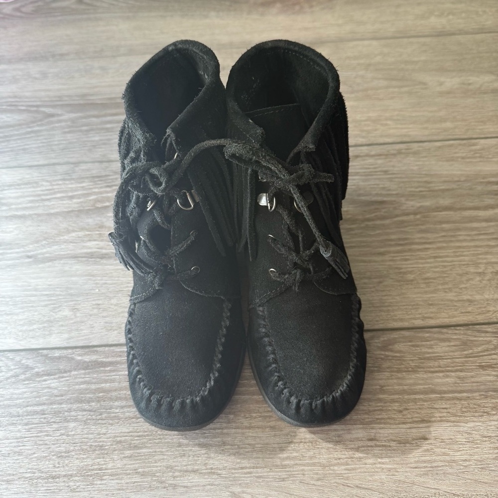 Minnetonka Black Lace-Up Fringe Wedge Booties